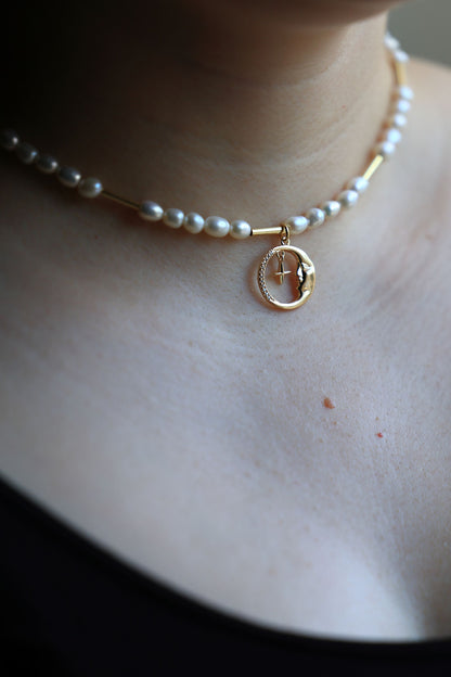 Natural Freshwater Pearl Necklace with a Crescent Moon Pendant