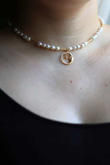 Natural Freshwater Pearl Necklace with a Crescent Moon Pendant