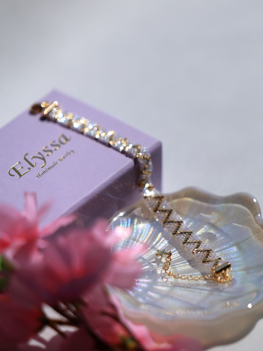 Crystal White and Lavender Bead Bracelet with 24K Gold-Plated Zigzag Pattern